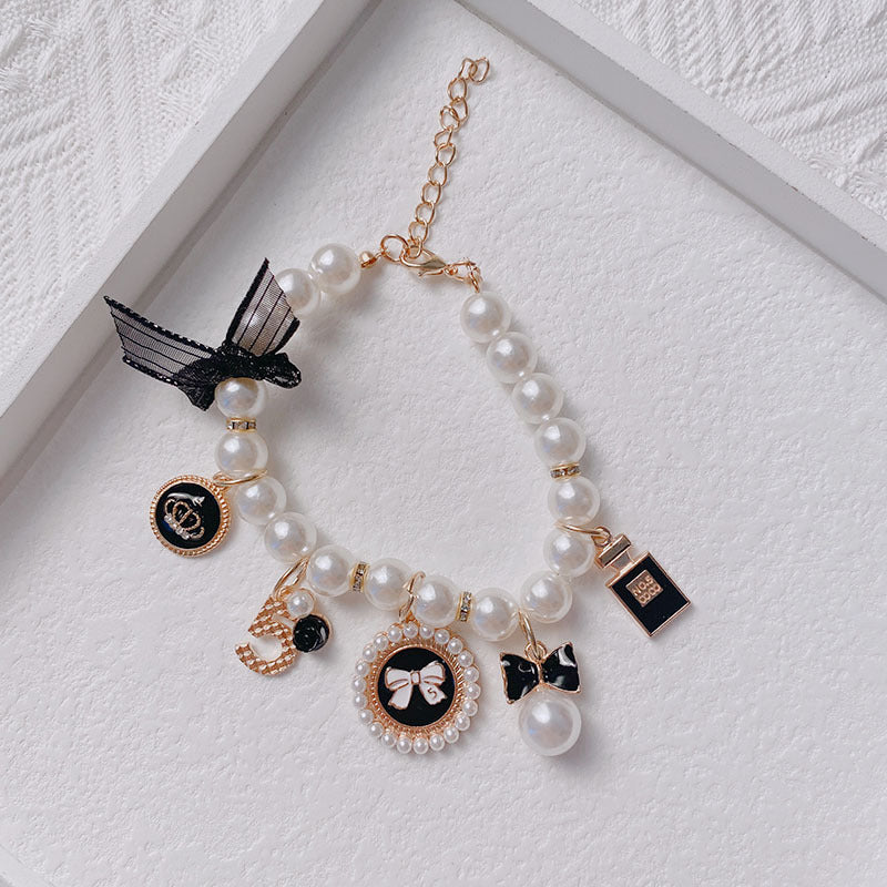 Black 4-PCS Pearl Charm Pet Necklace - Adjustable Bowknot Collar for Small Dogs & Cats (M: 25+5CM)